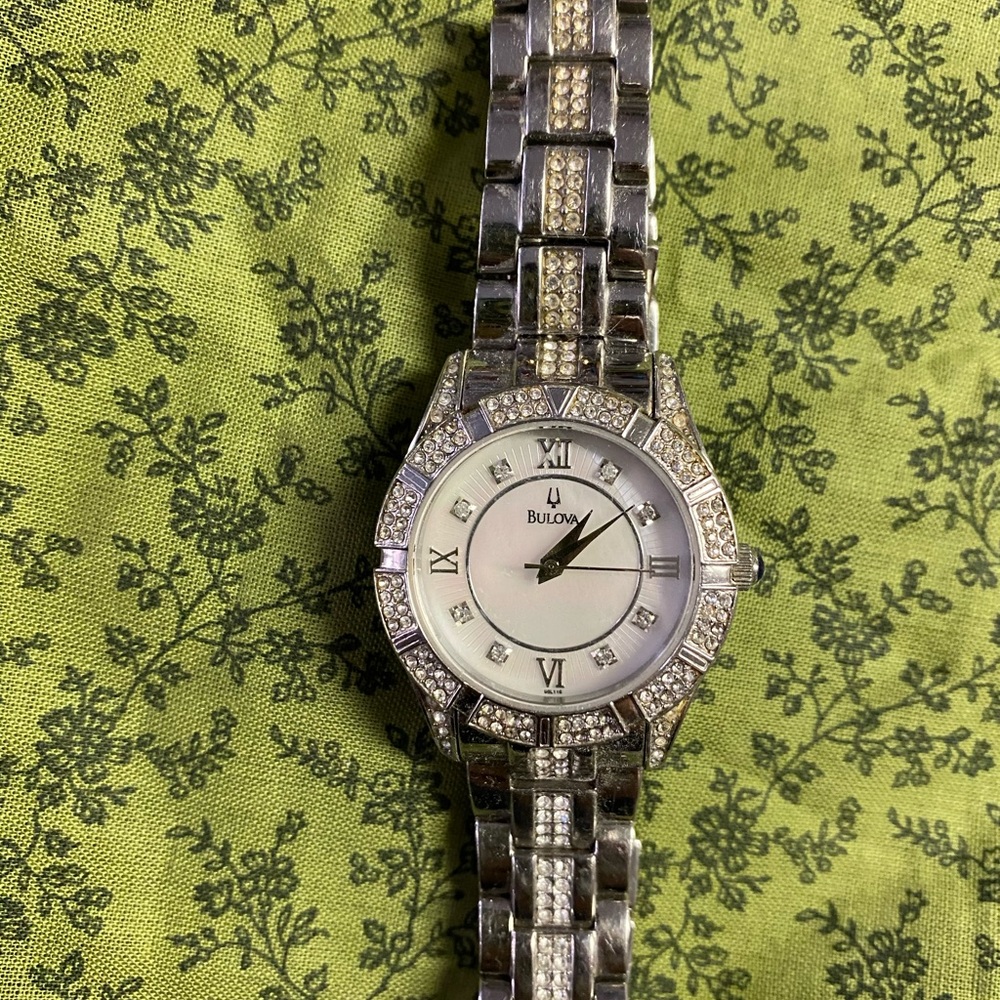 Bulova Mother of Pearl face, diamond bezel